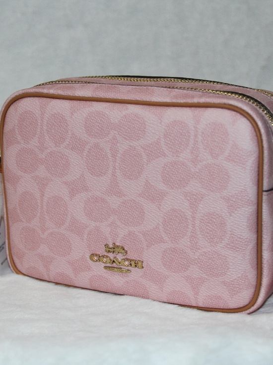 Coach Handbags - NWT Coach Mini Carey Powder Pink Purse